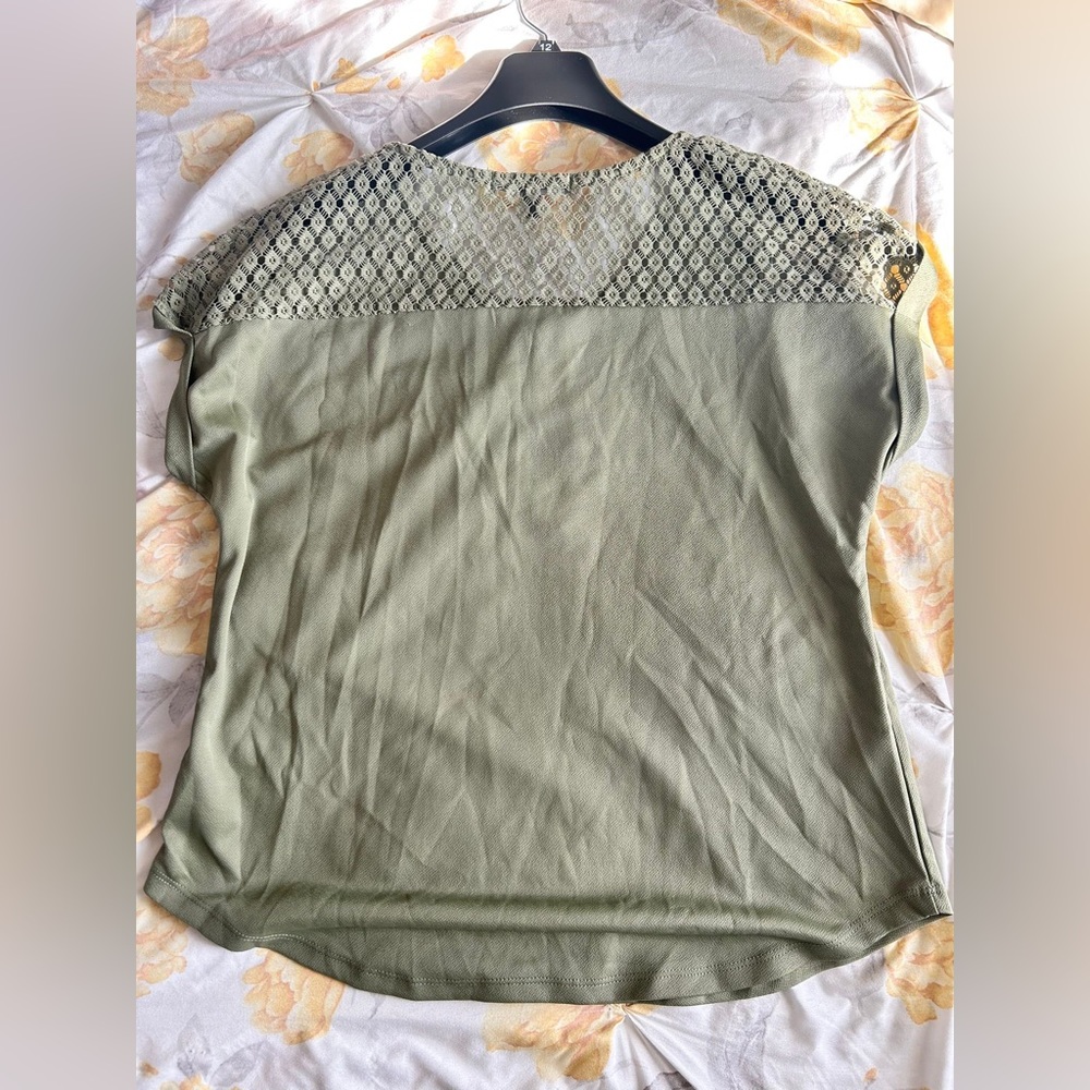 Worn a few times, true to size, wrinkles because it was in a suitcase.